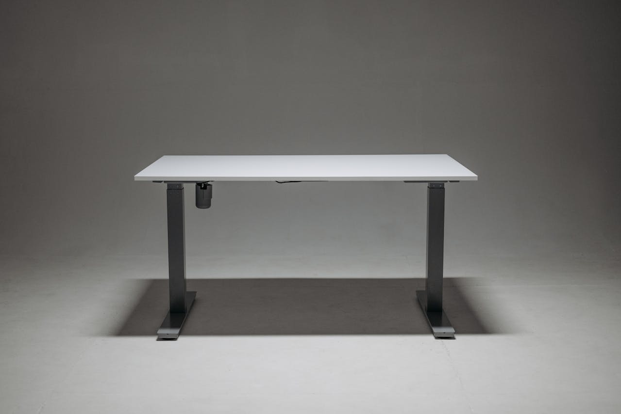 7 Ways Height Adjustable Desks Dramatically Improve Your Health and Productivity
